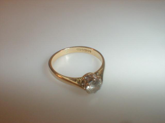 Appraisal: A solitaire diamond ring of approximately pts in ct gold