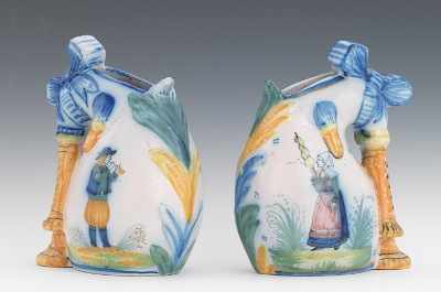 Appraisal: A Pair of Quimper Faience Bagpipe Form Vases Finely detailed