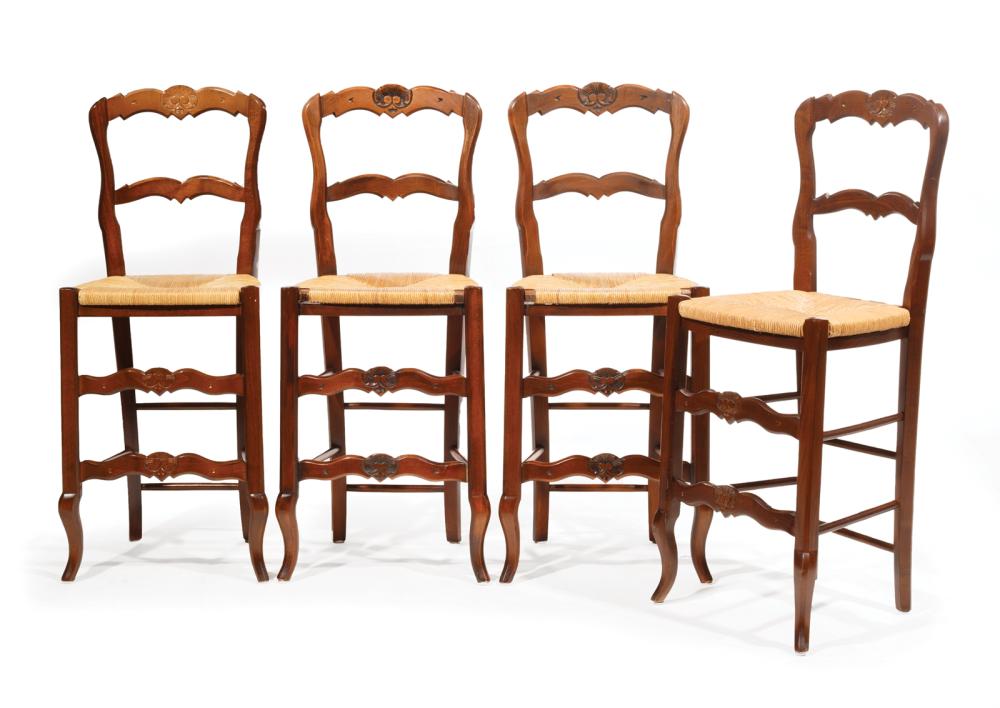 Appraisal: Four French Provincial Carved Fruitwood Rush Seat Bar Chairs th