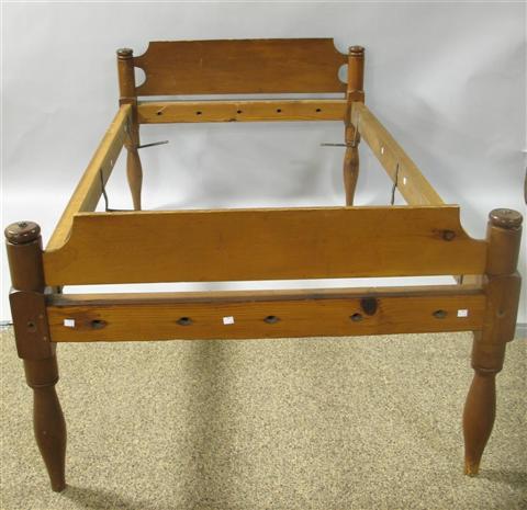 Appraisal: AMERICAN PINE TWIN ROPE BED Shaped head and footboards with