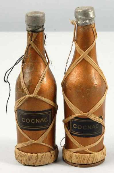 Appraisal: German Dresden Cognac Bottles Candy Container Description One missing closure