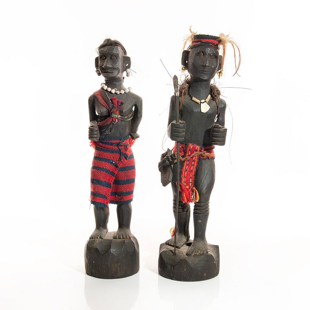 Appraisal: SOUTH AMERICAN TRIBAL WOOD CARVINGS OF MAN AND WOMAN Woman