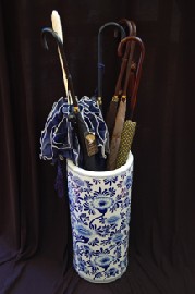 Appraisal: CERAMIC UMBRELLA STAND AND COLLECTION OF PARASOLES UMBRELLA STAND A