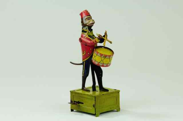 Appraisal: DISTLER DRUMMING MONKEY Lithographed tin with clockwork great color and