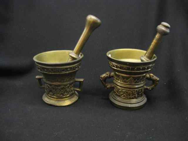 Appraisal: Pair of Bronzed Mortar Pestles