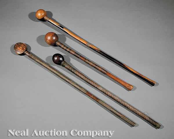 Appraisal: A Group of Four Zulu Carved Wood Knobkerrie Clubs South