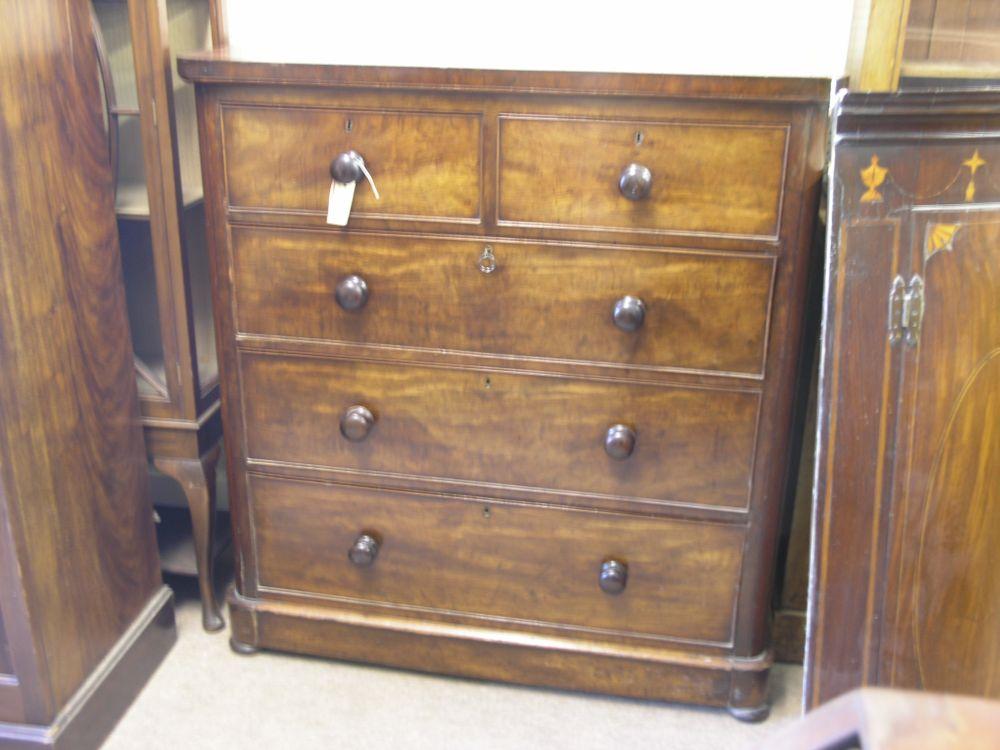 Appraisal: A Victorian mahogany bedroom chest two short and three long