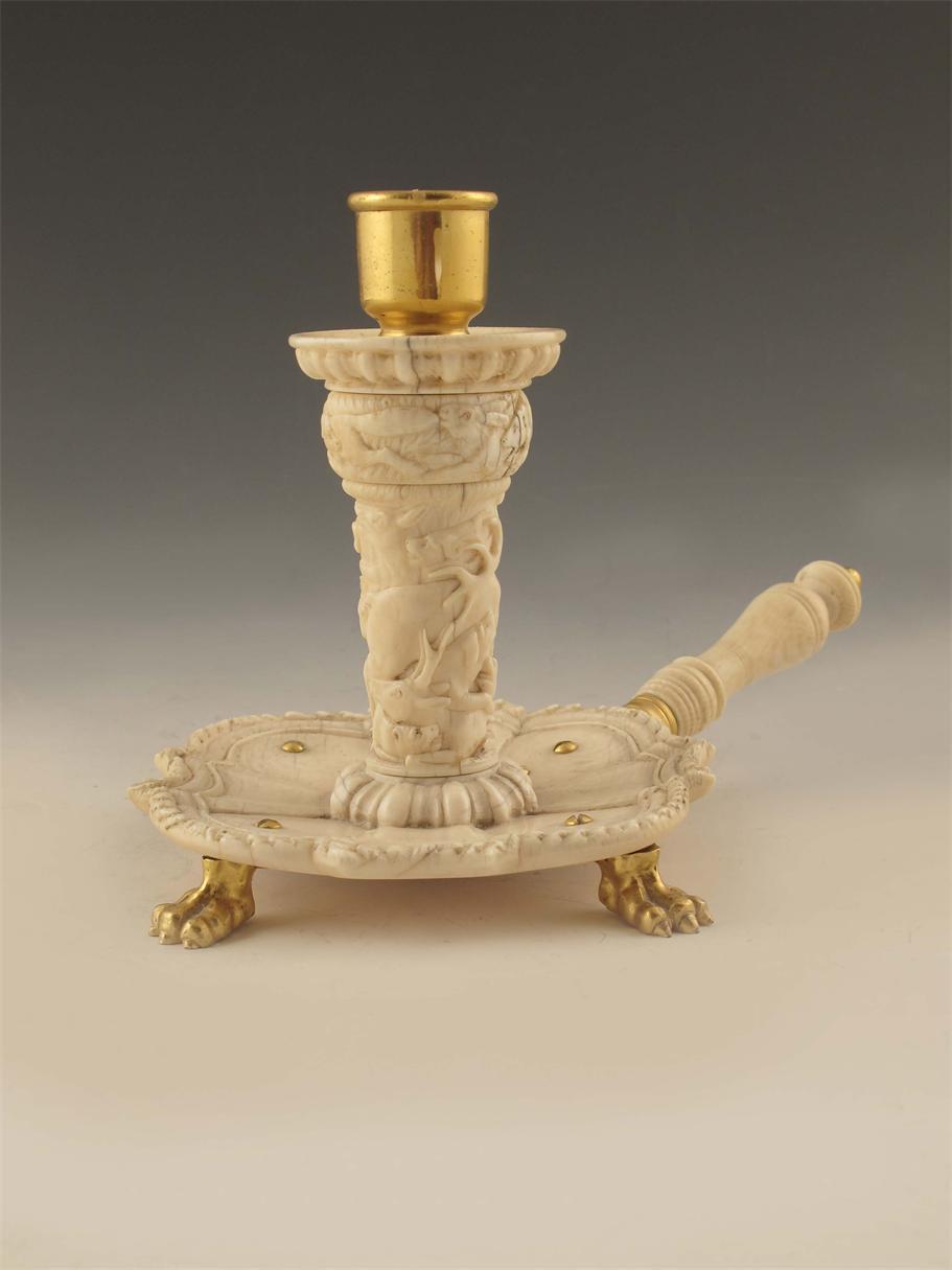 Appraisal: A German ivory and gilt metal chamberstick