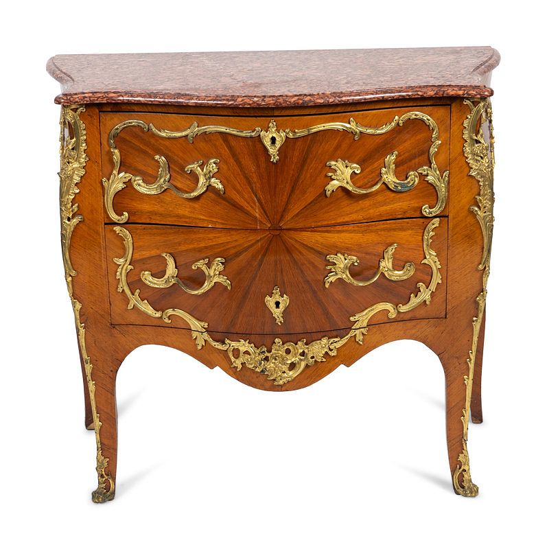 Appraisal: A Louis XV Style Bombe Commode with Sunburst Veneer and