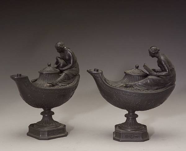 Appraisal: A pair of Wedgwood basalt figural oil lamps and covers