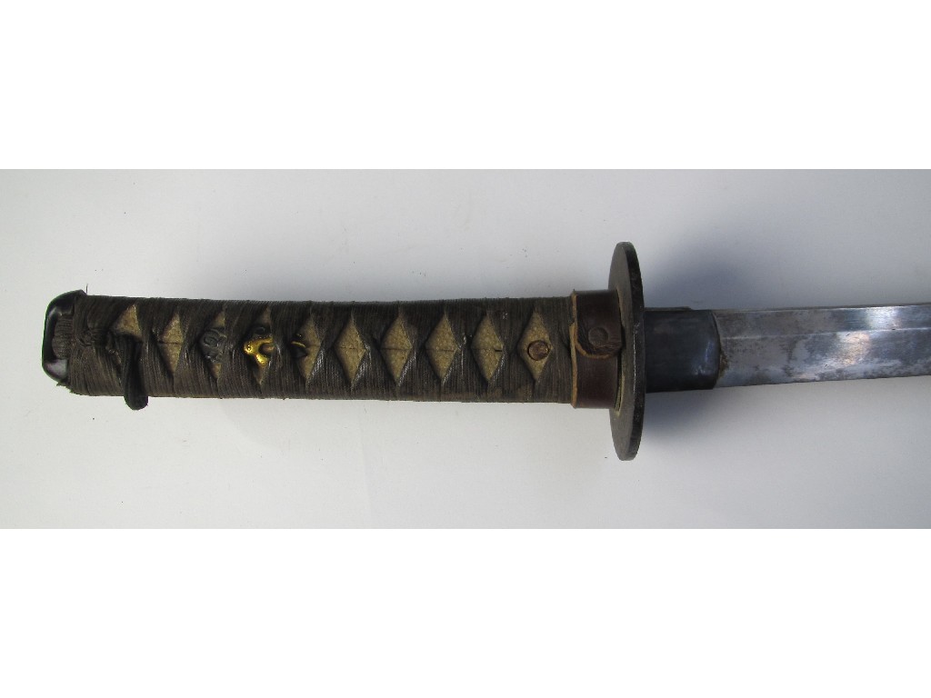 Appraisal: A Japanese Officers sword the fish skin and cord handle