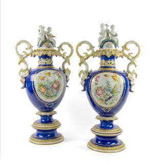 Appraisal: A PAIR OF MONUMENTAL ITALIAN FAIENCE LIDDED URNS CARPIE NOVE