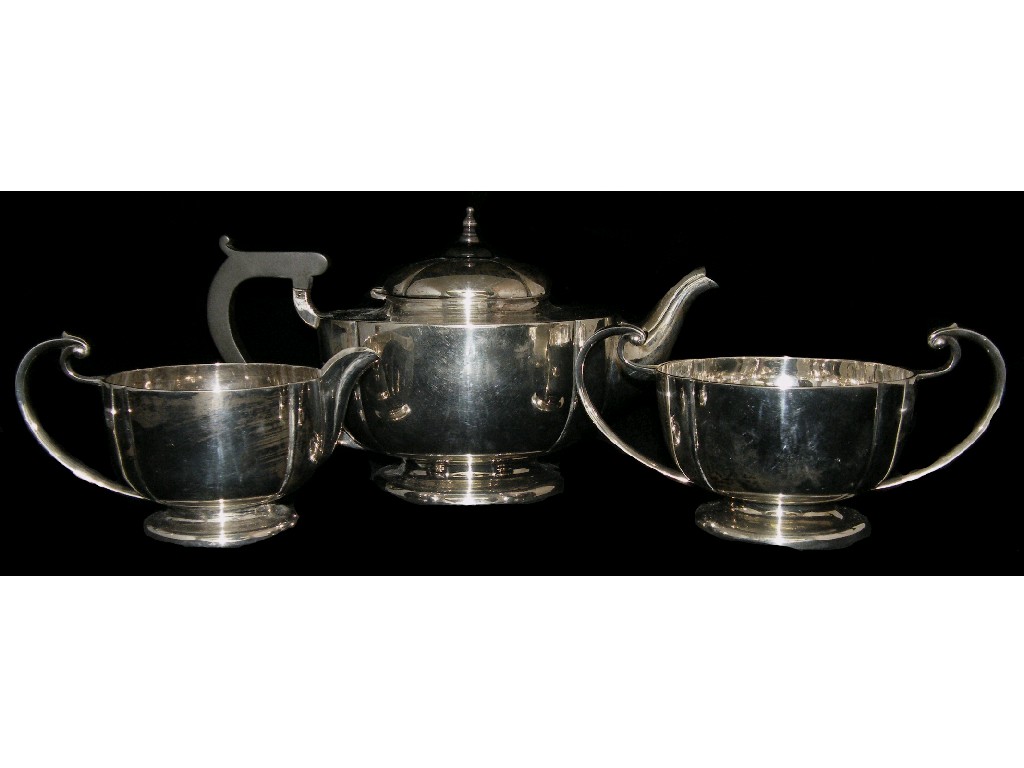 Appraisal: Three piece tea service of lobed form and with scrolling