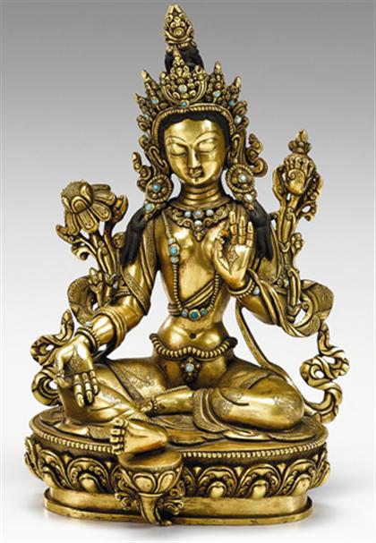 Appraisal: Well cast Tibetan gilt bronze and turquoise jeweled figure of