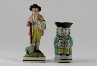 Appraisal: A Staffordshire model of a gardener leaning on his spade