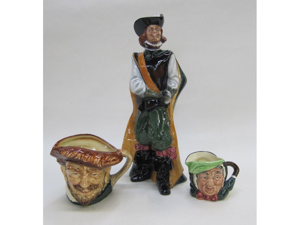 Appraisal: Royal Doulton figure Cavalier HN and two Doulton character jugs