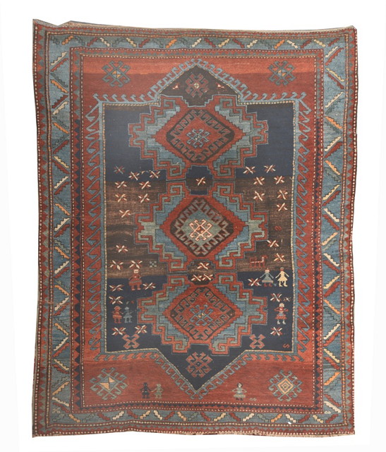 Appraisal: A KASAK RED GROUND RUG with a central interlinked triple