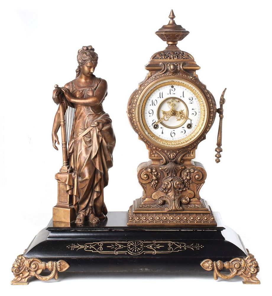 Appraisal: ANSONIA 'MUSIC' STATUE CLOCK The figure of a Classical maiden