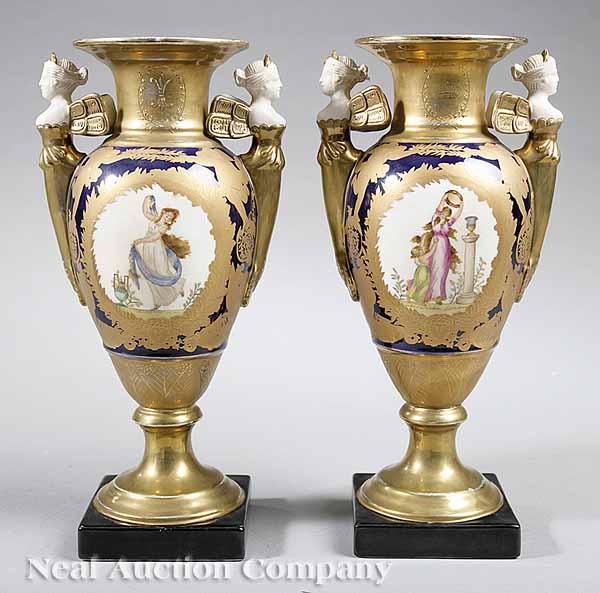 Appraisal: A Pair of Continental Urn-Form Porcelain Vases with Bisque Handles