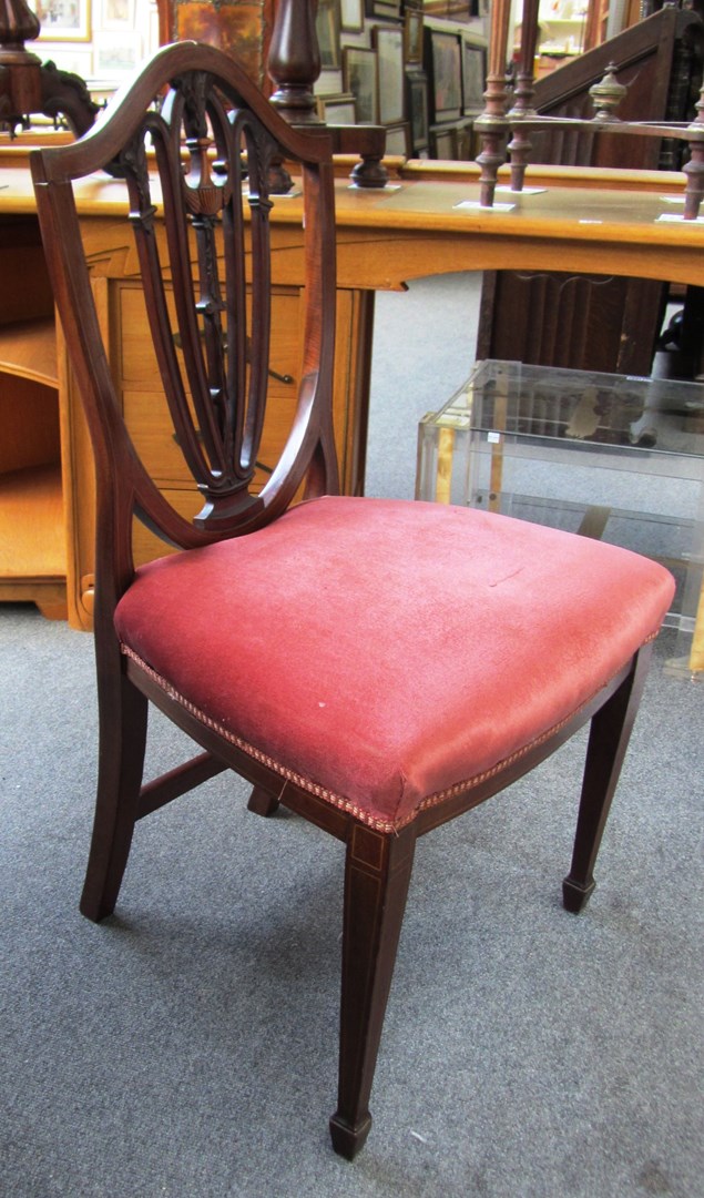 Appraisal: A set of six th century mahogany shield back dining