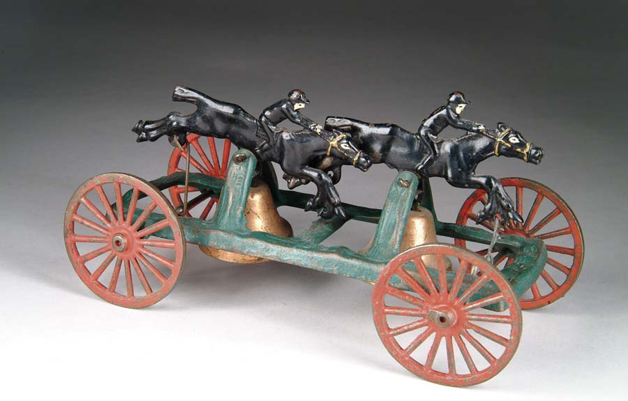 Appraisal: TWO HORSES GALLOPING BELL TOY Produced by The Hubley Mfg