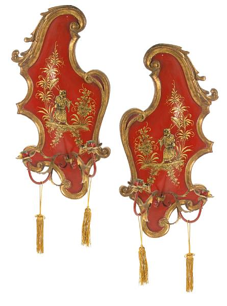 Appraisal: A pair of Rococo style scarlet japanned two light wall