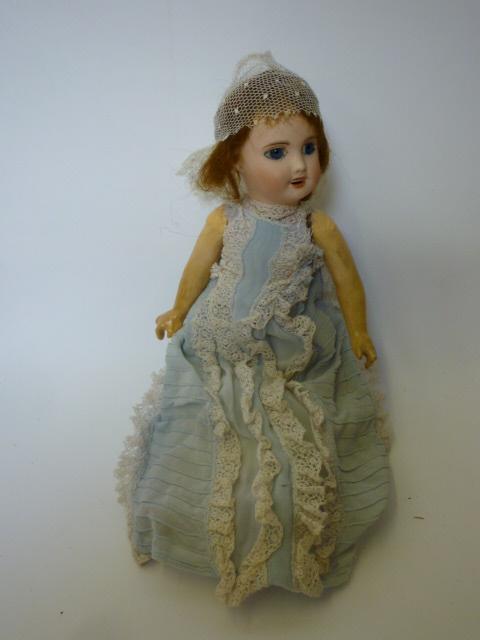 Appraisal: A Lanternier Cie Limoges bisque head girl doll with fixed