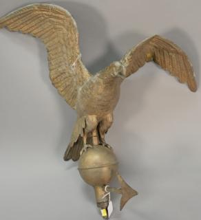 Appraisal: Copper eagle weathervane with wings spread perched on ball having