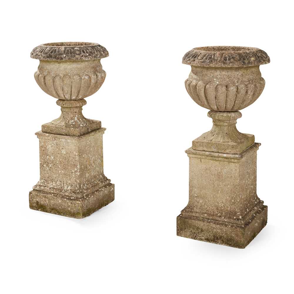 Appraisal: PAIR OF COMPOSITION STONE URNS AND PEDESTALS TH CENTURY of