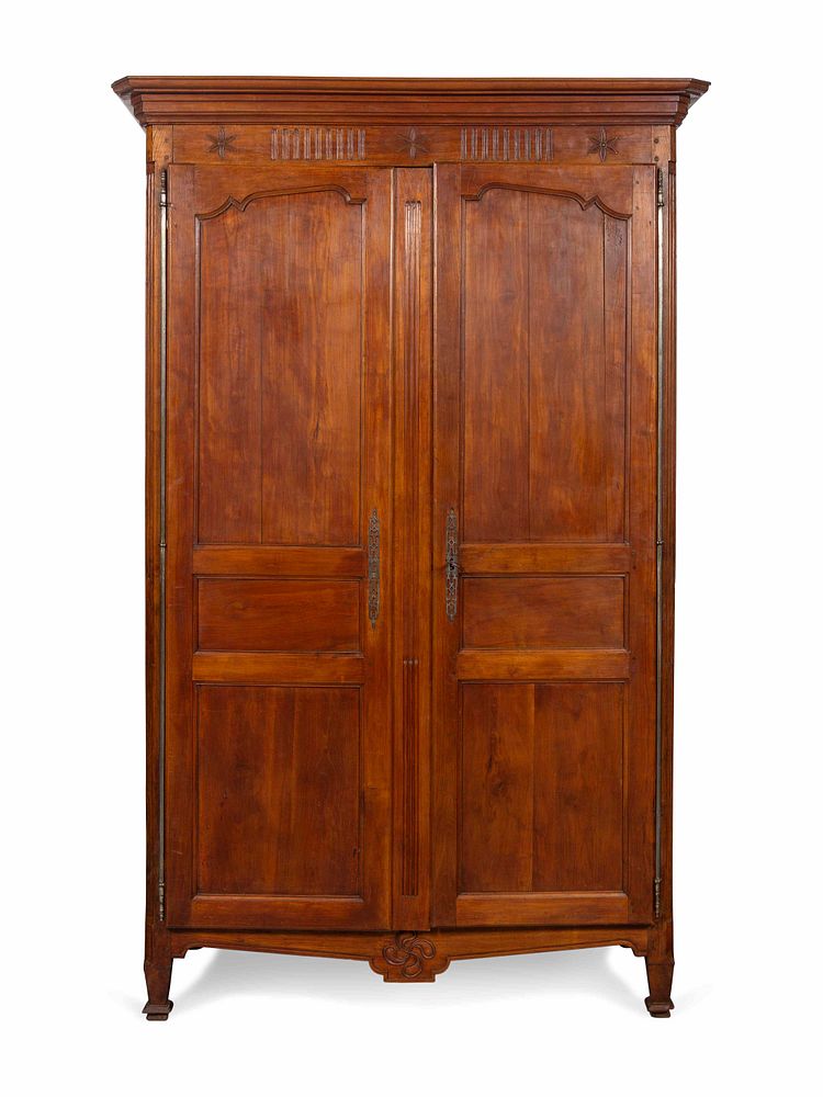 Appraisal: A French Provincial Carved Walnut Armoire A French Provincial Carved