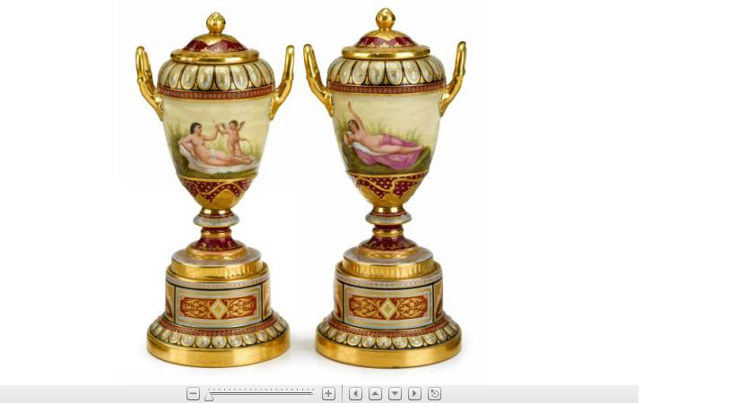 Appraisal: Pair of Royal Vienna ruby ground gilded porcelain covered urns