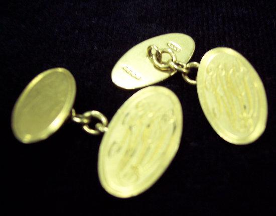 Appraisal: A pair of ct gold oval chain link cufflinks engraved