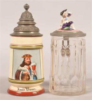 Appraisal: Two Various Steins Porcelain Stein Decorated with King in Robe