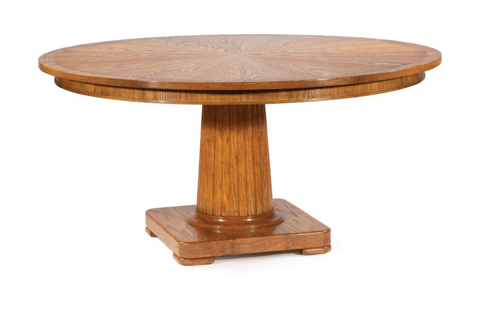 Appraisal: Rose Tarlow Oak Dining Table radial segmented top reverse tapered