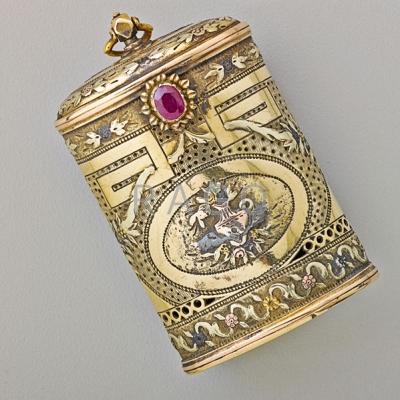 Appraisal: FOUR COLOR GOLD AND RUBY POMANDER CASE Oval pierced and