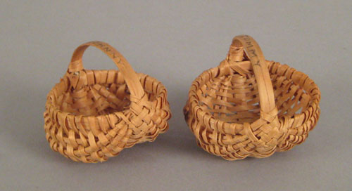 Appraisal: Two miniature splint oak buttocks baskets early th c h