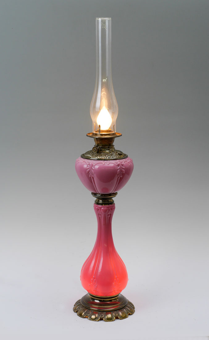 Appraisal: PLUME ATWOOD PINK GLASS OIL LAMP Pink fluted glass with