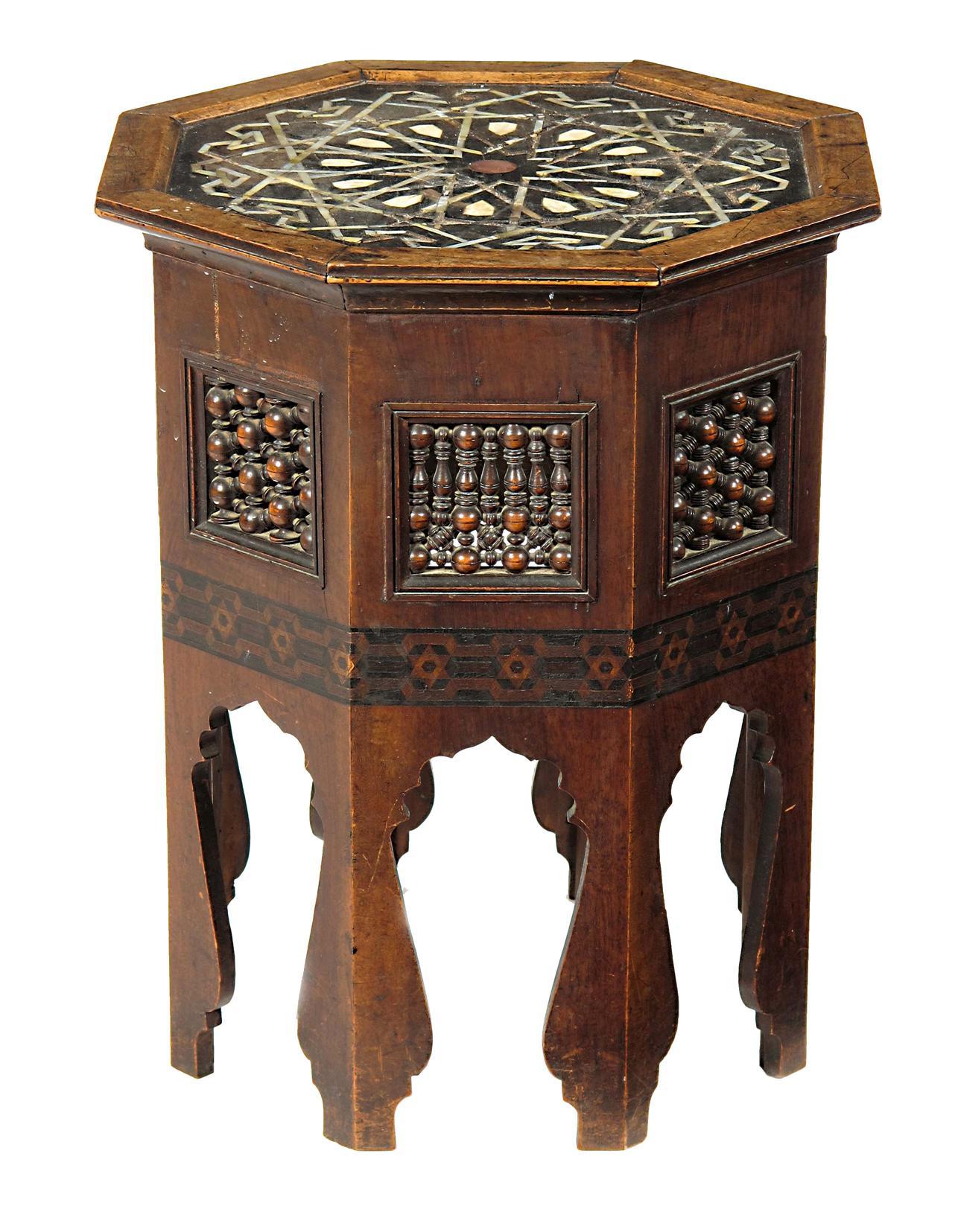 Appraisal: A Moorish walnut and parquetry inlaid octagonal occasional table