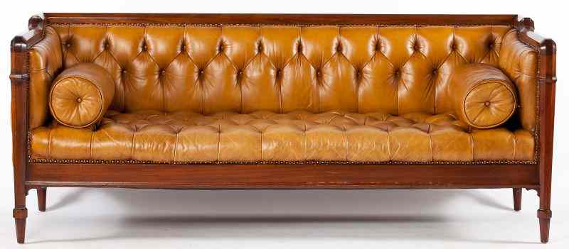 Appraisal: Edwardian Style Chesterfield Sofahaving a mahogany frame with button tufted