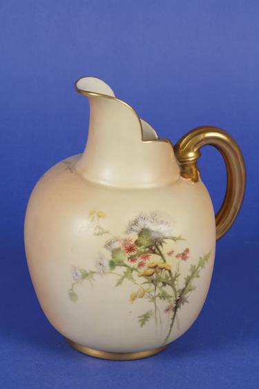 Appraisal: A ROYAL WORCESTER BLUSH IVORY FLAT SIDED JUG with painted