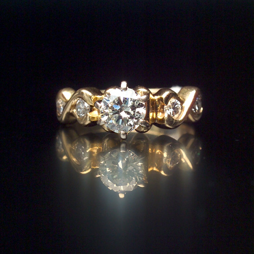 Appraisal: DIAMOND Engament ring in k yellow gold Circular brilliant-cut diamond