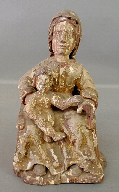 Appraisal: - Continental carved wood seated Madonna and Child th c