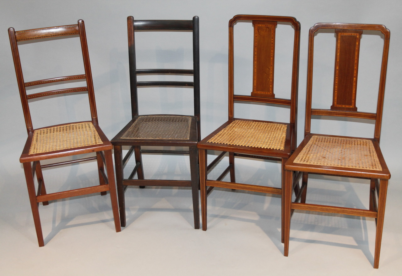 Appraisal: Four various Edwardian mahogany and boxwood strung dining chairs each