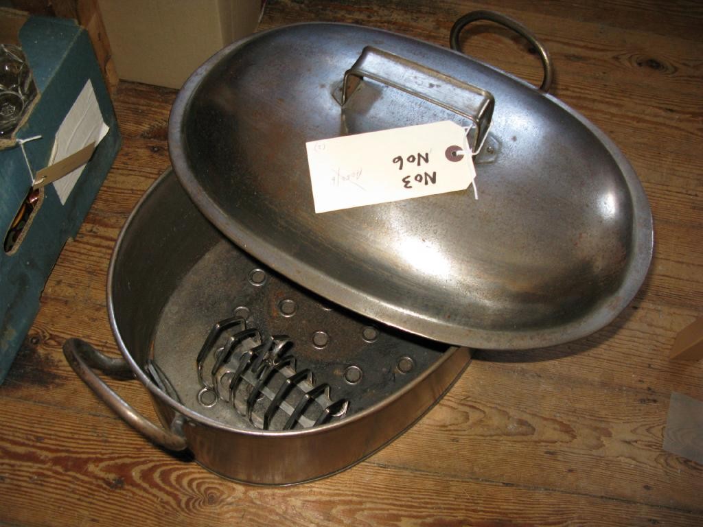 Appraisal: A steel fish kettle oval shape with cover and a