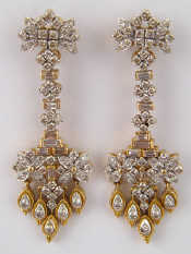 Appraisal: A pair of yellow metal tests carat gold baguette and