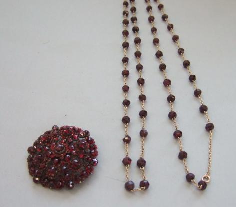 Appraisal: A Bohemian garnet set brooch in a circular design and