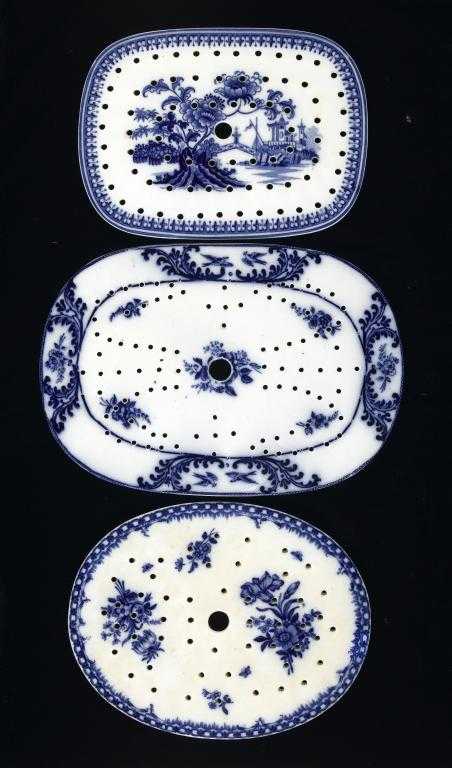 Appraisal: THREE WEDGWOOD COPELAND AND OTHER BLUE PRINTED EARTHENWARE DRAINERS a