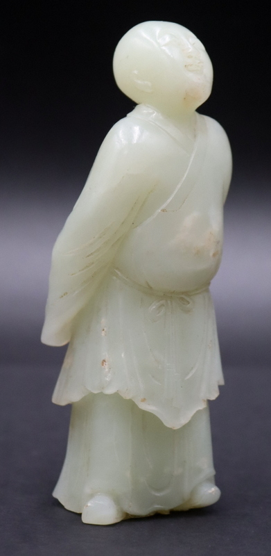 Appraisal: CHINESE CARVED JADE STANDING FIGURE Chinese carved jade standing figure