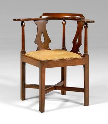 Appraisal: Chippendale mahogany corner chair shaped arms and pierced splats on