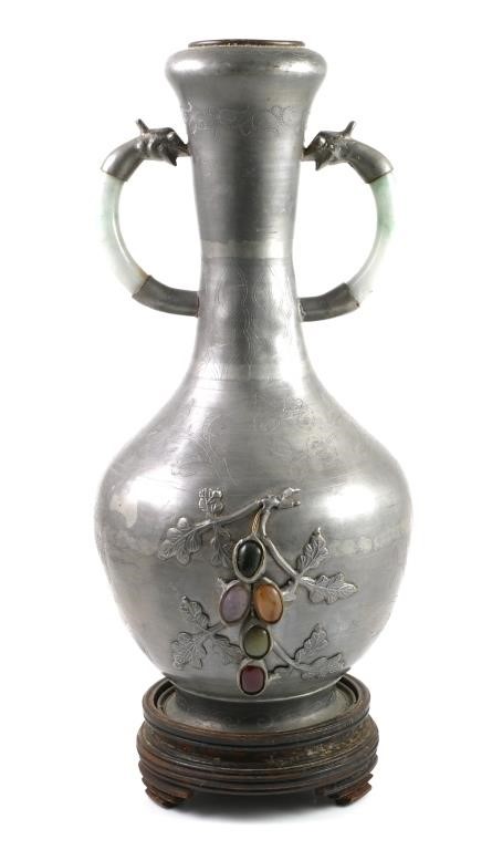 Appraisal: Chinese pewter bottle form vase with incised and raised floral